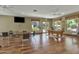 Spacious game room with a pool table, lounge seating, and plenty of natural light at 3131 E Legacy Dr # 1057, Phoenix, AZ 85042