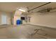 Spacious garage with durable flooring, ample storage, and access to utilities at 3131 E Legacy Dr # 1057, Phoenix, AZ 85042