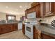 Fully-equipped kitchen with granite countertops and appliances perfect for Gathering meals at 3131 E Legacy Dr # 1057, Phoenix, AZ 85042