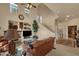 Inviting living room with fireplace, high ceilings, and open floor plan at 3131 E Legacy Dr # 1057, Phoenix, AZ 85042