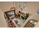 Open-concept living room with tall ceilings, fireplace, and large windows for natural light at 3131 E Legacy Dr # 1057, Phoenix, AZ 85042