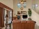 Spacious living room with fireplace, high ceilings, and large windows at 3131 E Legacy Dr # 1057, Phoenix, AZ 85042