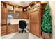 Custom office space with built-in shelves and a Murphy bed, perfect for a home office or guest room at 3131 E Legacy Dr # 1057, Phoenix, AZ 85042
