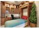 Custom office space with built-in shelves and a Murphy bed, perfect for a home office or guest room at 3131 E Legacy Dr # 1057, Phoenix, AZ 85042