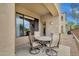 Cozy patio featuring outdoor table and chairs with views of the surrounding landscape at 3131 E Legacy Dr # 1057, Phoenix, AZ 85042
