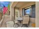 Inviting covered patio with a table and chairs, perfect for outdoor dining and relaxing at 3131 E Legacy Dr # 1057, Phoenix, AZ 85042