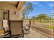 Comfortable covered patio with a view of the golf course, ideal for outdoor relaxation at 3131 E Legacy Dr # 1057, Phoenix, AZ 85042