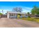Lovely single-Gathering home with a spacious driveway and beautifully landscaped front yard at 3243 E Sheridan St, Phoenix, AZ 85008