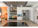 Well-equipped kitchen featuring stainless steel appliances and built in island cooktop at 3243 E Sheridan St, Phoenix, AZ 85008