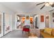 Open-concept living area with views into the kitchen and a neutral color palette at 3243 E Sheridan St, Phoenix, AZ 85008