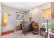 Entertaining space with a wet bar, bar seating, and access to the outdoors at 3243 E Sheridan St, Phoenix, AZ 85008