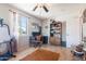 Inviting office space with natural light, computer setup, and warm, wood floors at 3243 E Sheridan St, Phoenix, AZ 85008