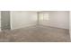 Bedroom with neutral walls, a window with blinds, and wall-to-wall carpeting at 34949 N Spur Cir, San Tan Valley, AZ 85144