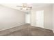 Bedroom featuring neutral walls, carpeted floor, and a ceiling fan at 34949 N Spur Cir, San Tan Valley, AZ 85144