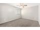 Bedroom featuring neutral walls, carpeted floor, and a ceiling fan at 34949 N Spur Cir, San Tan Valley, AZ 85144