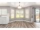 Cozy dining area with natural light and a sliding glass door to the backyard at 34949 N Spur Cir, San Tan Valley, AZ 85144