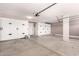 Garage featuring built-in storage cabinets with black hardware at 34949 N Spur Cir, San Tan Valley, AZ 85144