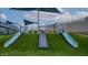 Slides in the community play area with a bridge, slides and artificial turf at 3808 S Buttercup --, Mesa, AZ 85212