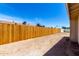 Fenced backyard space with desert landscaping at 4636 W Mission Ln, Glendale, AZ 85302