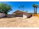 Backyard of home with desert landscaping and covered patio at 4636 W Mission Ln, Glendale, AZ 85302