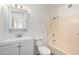 Bright bathroom features a shower-tub combo, updated vanity, and light fixtures providing a refreshed look at 4636 W Mission Ln, Glendale, AZ 85302