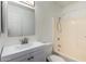 Bright bathroom features a shower-tub combo, updated vanity, and light fixtures providing a refreshed look at 4636 W Mission Ln, Glendale, AZ 85302