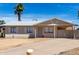 Charming single-story home with a well-maintained front yard and desert landscaping at 4636 W Mission Ln, Glendale, AZ 85302