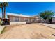 Single-story home featuring an open front yard under a clear blue sky at 4636 W Mission Ln, Glendale, AZ 85302