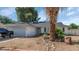 Charming single-story home with low-maintenance landscaping and a two-car garage, set against a bright sky at 4813 W Belmont Ave, Glendale, AZ 85301