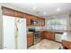 Efficient kitchen with granite countertops, stainless steel appliances, and ample cabinet space for storage solutions at 4813 W Belmont Ave, Glendale, AZ 85301
