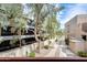 View of community landscaping and building at 4850 E Desert Cove Ave # 240, Scottsdale, AZ 85254