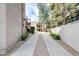 Well-maintained walkway between buildings in the community at 4850 E Desert Cove Ave # 240, Scottsdale, AZ 85254