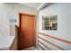 Exterior view of the front door of unit 240, with secure entrance and visible unit number at 4850 E Desert Cove Ave # 240, Scottsdale, AZ 85254