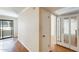 Hallway leading to the balcony and closets with sliding mirrored doors at 4850 E Desert Cove Ave # 240, Scottsdale, AZ 85254