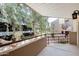 Outdoor patio with metal railing and mature landscaping at 4850 E Desert Cove Ave # 240, Scottsdale, AZ 85254