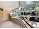 Outdoor patio with metal railing and view of a commercial building at 4850 E Desert Cove Ave # 240, Scottsdale, AZ 85254