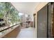 Outdoor patio with metal railing and shade at 4850 E Desert Cove Ave # 240, Scottsdale, AZ 85254