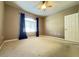 Spacious bedroom featuring neutral color palette, plush carpet, and a ceiling fan at 5335 E Shea Blvd # 2045, Scottsdale, AZ 85254