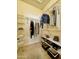 Walk-in closet with ample shelving and hanging space for an organized wardrobe at 5335 E Shea Blvd # 2045, Scottsdale, AZ 85254
