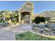 Elegant clubhouse entrance with lush landscaping, creating a welcoming and impressive arrival experience at 5335 E Shea Blvd # 2045, Scottsdale, AZ 85254