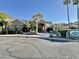 Beautiful community clubhouse with lush landscaping and a well-maintained exterior at 5335 E Shea Blvd # 2045, Scottsdale, AZ 85254
