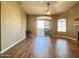 Sun-filled living room with wood floors, a ceiling fan, and access to a patio, great for relaxing at 5335 E Shea Blvd # 2045, Scottsdale, AZ 85254