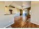 Bright living room with wood floors, ceiling fan, and sliding door access to the outside patio at 5335 E Shea Blvd # 2045, Scottsdale, AZ 85254