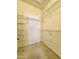 Organized walk-in closet with wire shelving on carpeted floor, providing ample storage space at 5335 E Shea Blvd # 2045, Scottsdale, AZ 85254