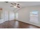 Large bedroom with wood floors and ample natural light at 5628 S 21St Pl, Phoenix, AZ 85040