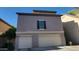 Two-story home featuring a two-car garage and well-maintained exterior at 5628 S 21St Pl, Phoenix, AZ 85040