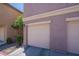 Home exterior showcasing a two-car garage at 5628 S 21St Pl, Phoenix, AZ 85040