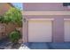 Home exterior featuring a garage entrance at 5628 S 21St Pl, Phoenix, AZ 85040
