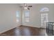 Bright open living area with hardwood floors, and natural light from multiple windows at 5628 S 21St Pl, Phoenix, AZ 85040