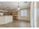 Bright dining area with tile floors, pendant lighting, and backyard access, ideal for gatherings at 5926 W Questa Dr, Glendale, AZ 85310